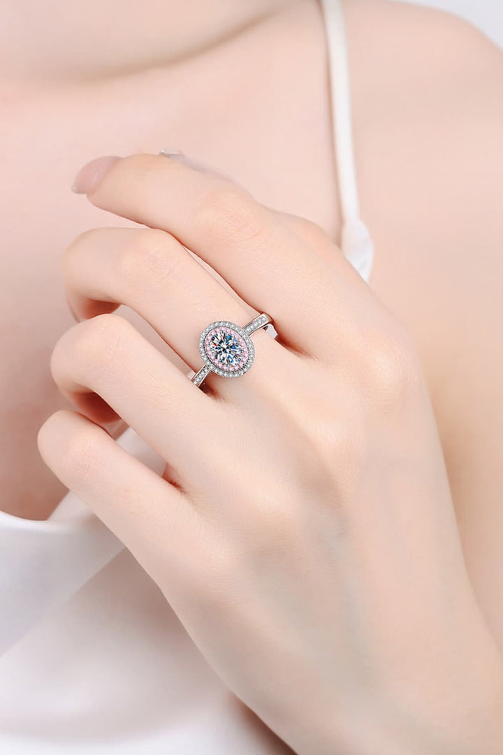 Sterling silver 1-carat moissanite halo ring from Cowgirl Charm, showcasing a sparkling center stone and intricate halo design.