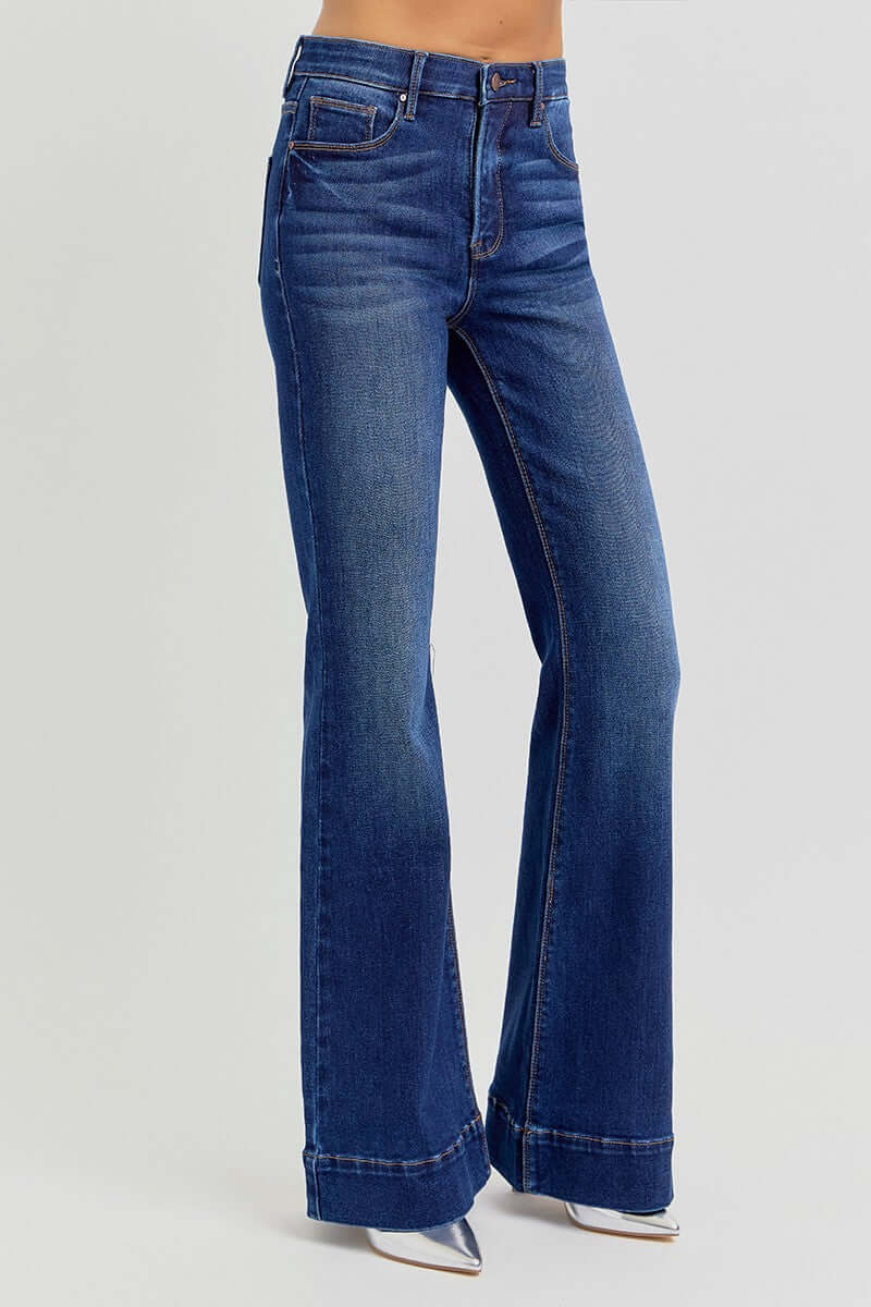 Risen Tummy Control High Rise Flare Jeans with elastic band, showcasing the fitted waist and flared leg style.