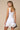 Blue Blush 3D floral hem square neck mini dress, showcasing a stylish floral pattern and square neckline in a close-up view.
