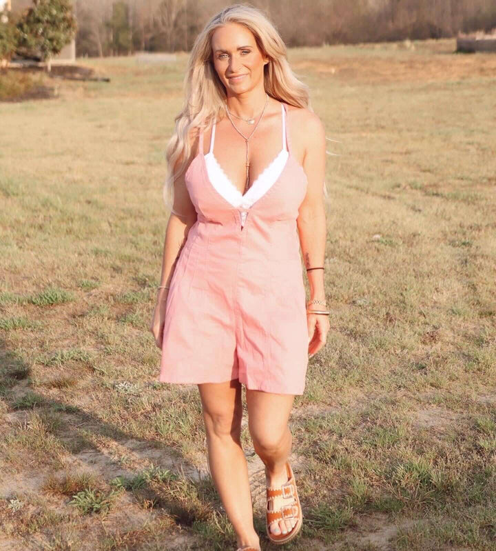 Wisteria Lane lightweight denim romper with adjustable straps, featuring a casual style and classic denim fabric.