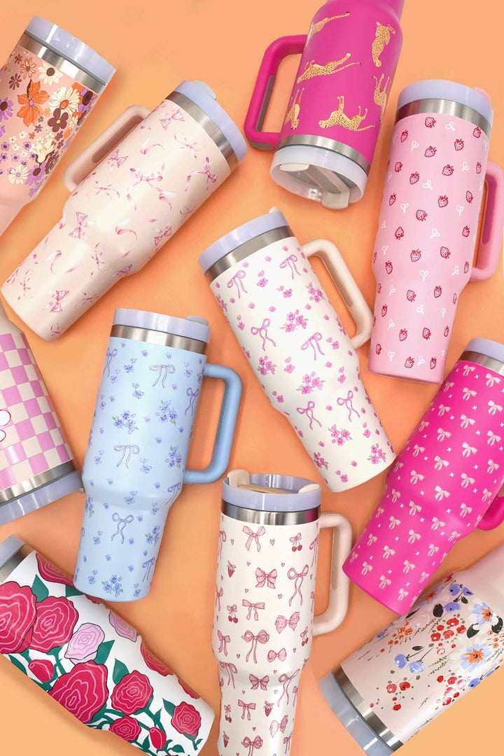 40oz stainless steel tumbler by JOSSLYN, all styles, durable cup with double-wall insulation for cold or hot beverages.