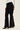 Judy Blue Jaqueline Black lace hem ultra flare jeans showing high-waisted denim with lace-trimmed flared legs and stylish design.