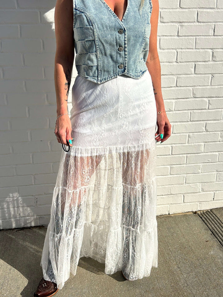 Lucky and Blessed long lace skirt with intricate lace details and flowing design, displayed on a plain background.