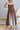 Chocolate brown and ivory contrast tie shoulder midi dress by Sunday Up, featuring a stylish and elegant design.