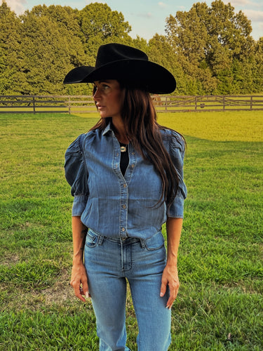 Women's chambray puff sleeve button-up blouse from Vine and Love, featuring a Western denim top with a relaxed fit and stylish details.