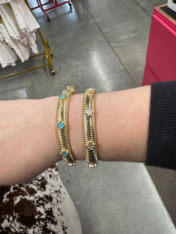 Gold Cuff Bracelet With Flower Pendant