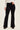 Judy Blue Jaqueline black denim flare jeans with lace hem, showing the stylish ultra flare design and detailed lace trim.