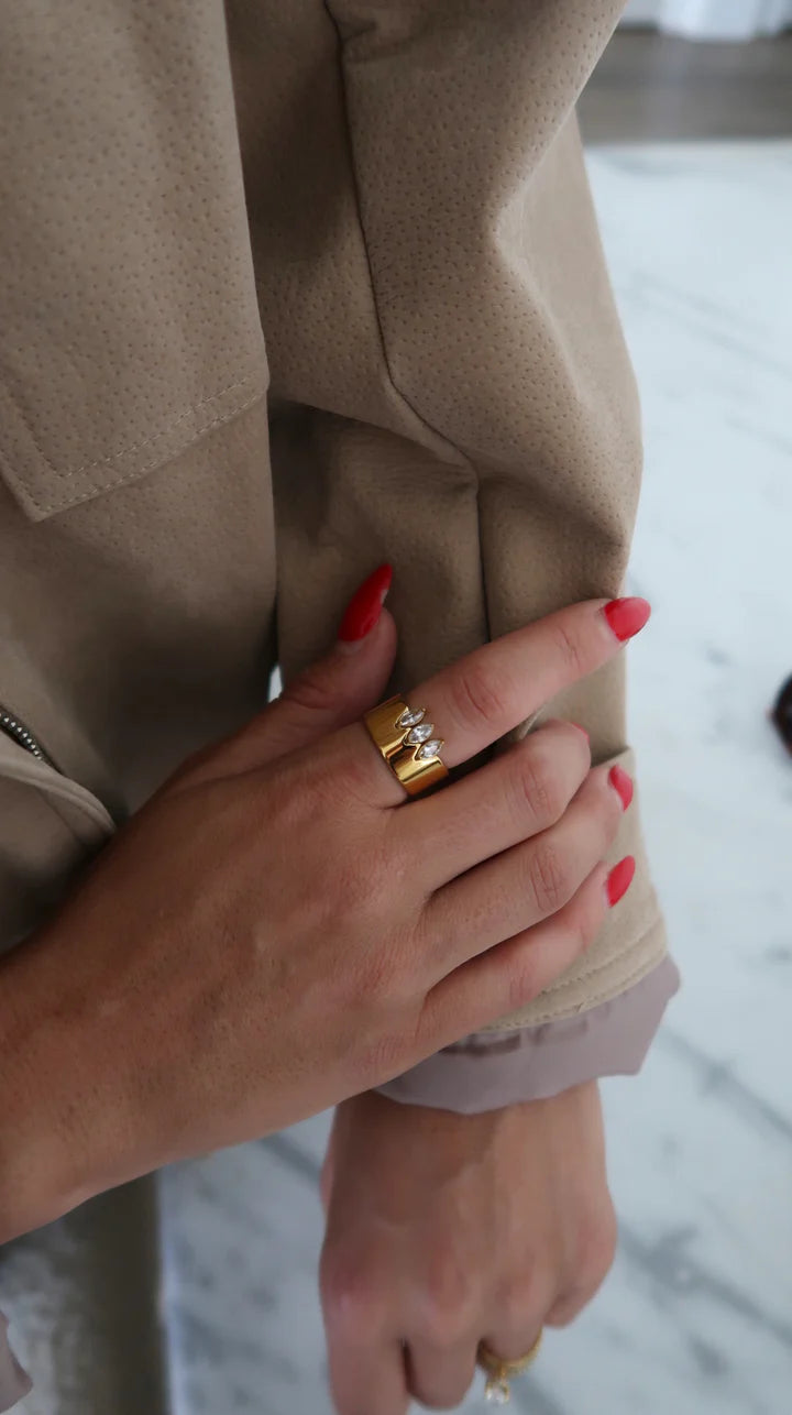 Chansuttpearls Holly Ring featuring a pearl centerpiece and elegant silver band, perfect for sophisticated jewelry styling.