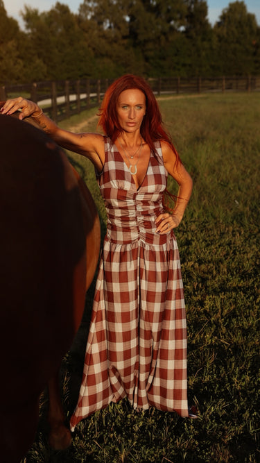 Brown plaid ruched bodice maxi dress by Sunday Up, featuring a flowing skirt and fitted bodice, styled for casual or formal occasions.