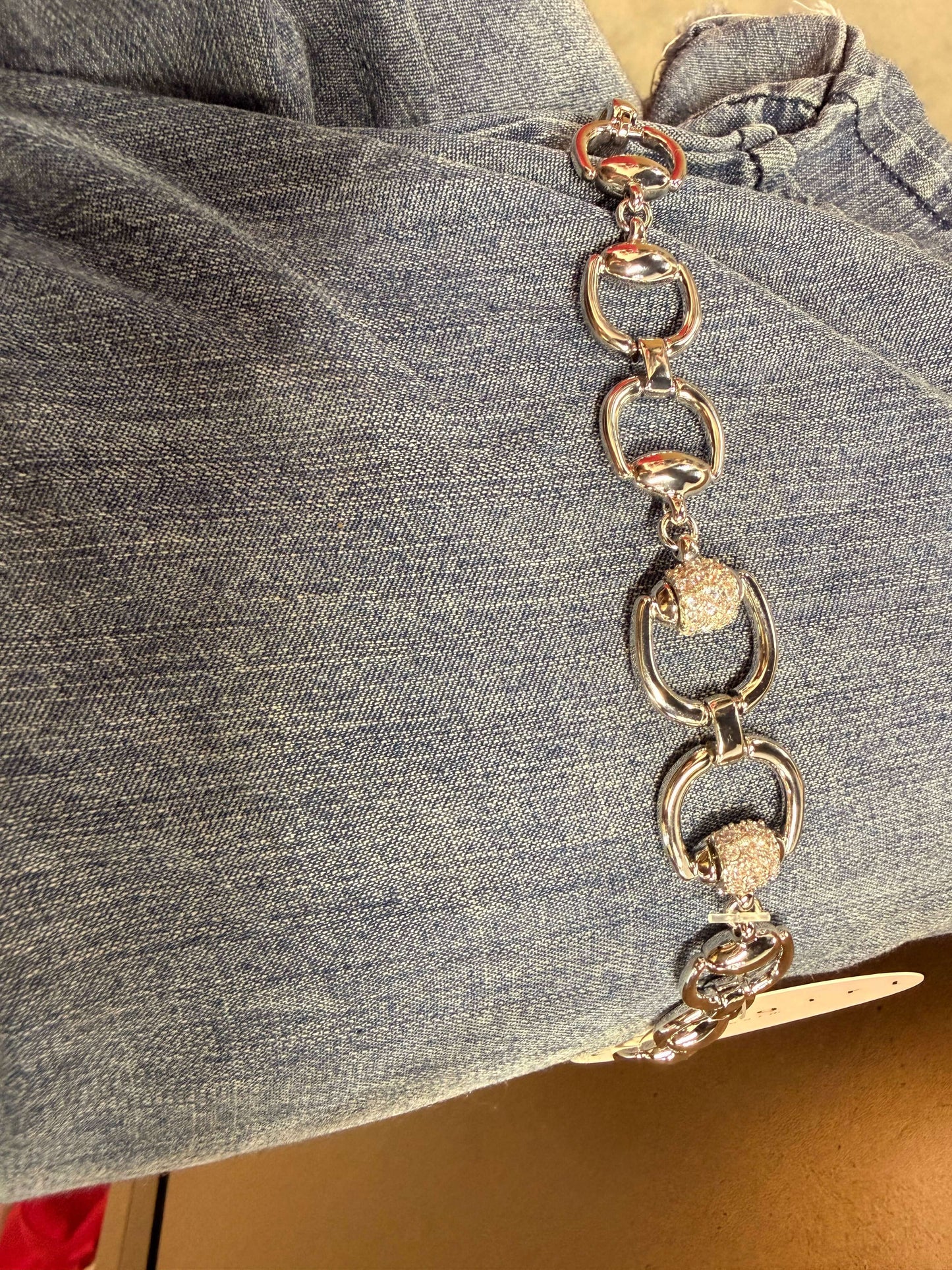 Silver and diamond bead bracelet from Cowgirl Charm, featuring sparkling gemstones on a stylish jewelry accessory.