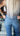 Haala Denim Bella flare trousers in deep ocean denim with gold accents, showcasing stylish wide-leg design and high-quality fabric.