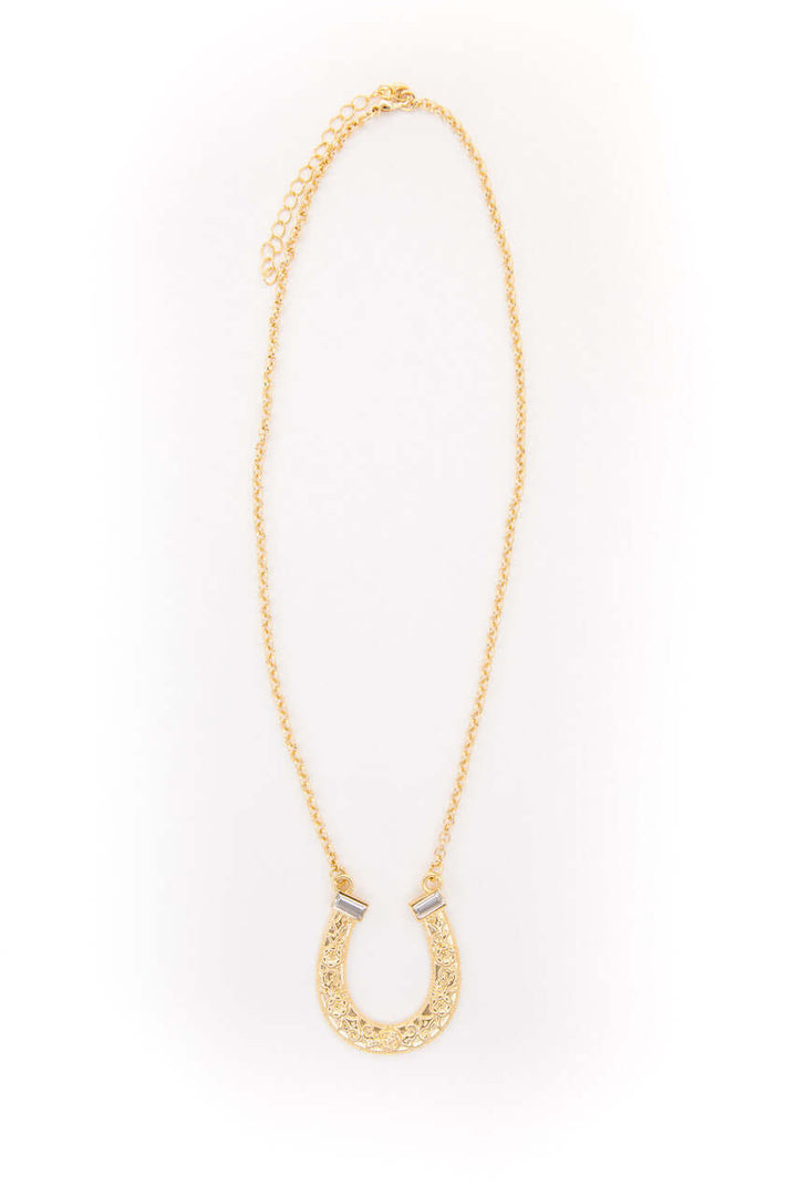 18-inch 18K gold plated horse shoe necklace with rhinestone accents by West & Co., featuring a detailed horse shoe pendant.
