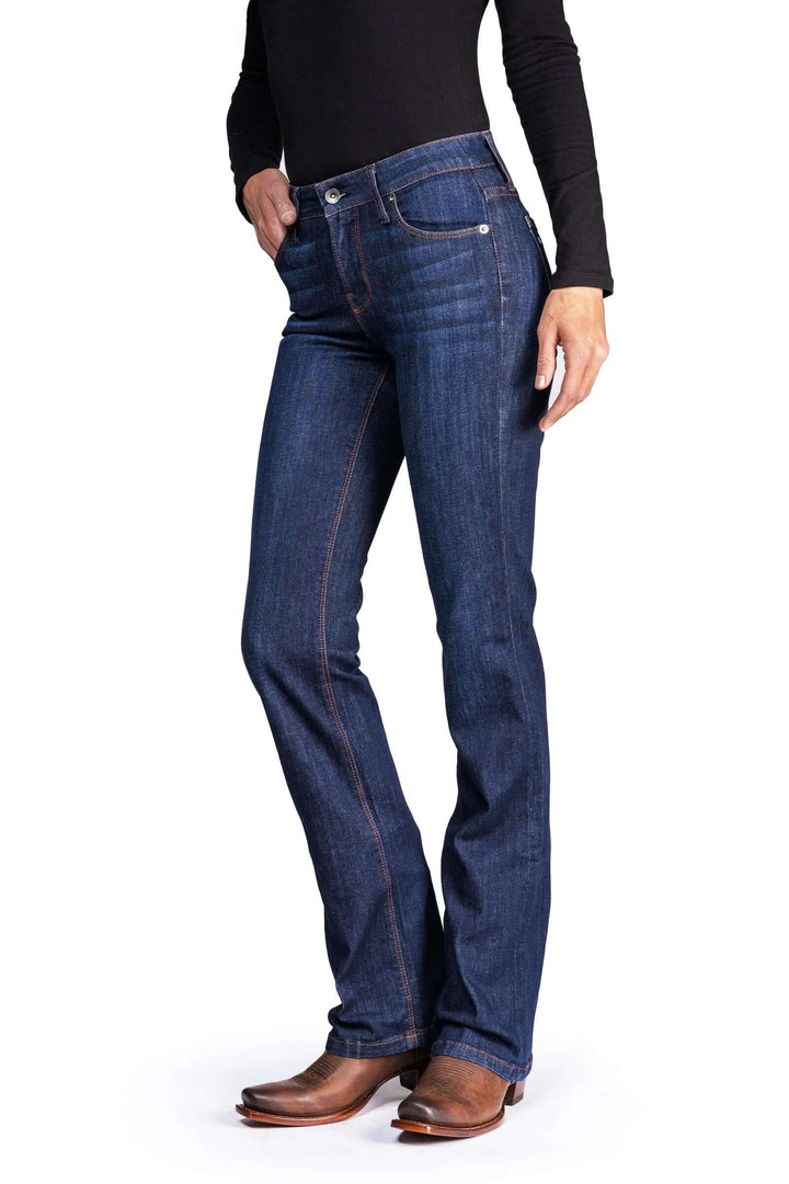 Haala Denim Venice bootcut jeans in deep ocean with orange-copper stitching, shown on a model highlighting fit and style.