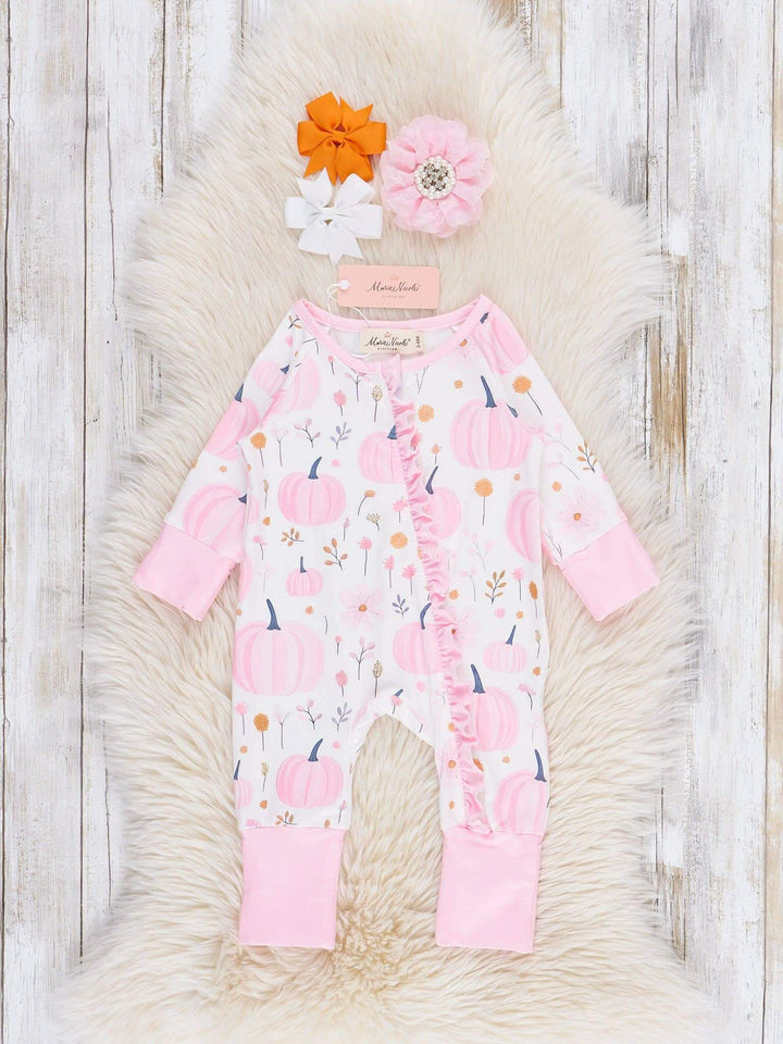Kids' Cozy in the Patch sleeper pajamas by Marie Nicole Clothing, featuring colorful patch patterns and soft fabric.