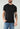Black American Bullseye shirt by Kimes featuring a classic design and comfortable fit displayed on a model.