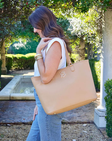 Caroline Hill oversized tote bag made of vegan leather, featuring zipper closure, ideal for work, travel, and everyday use.