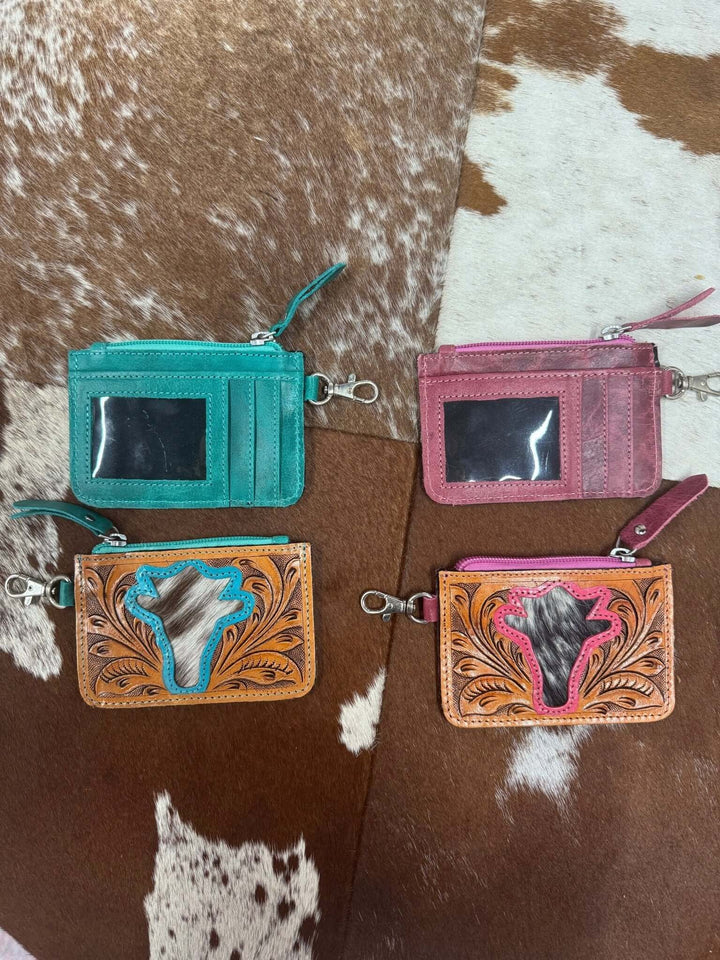 Cowgirl Charm change purse made of durable leather, featuring multiple card slots and a secure zip closure.