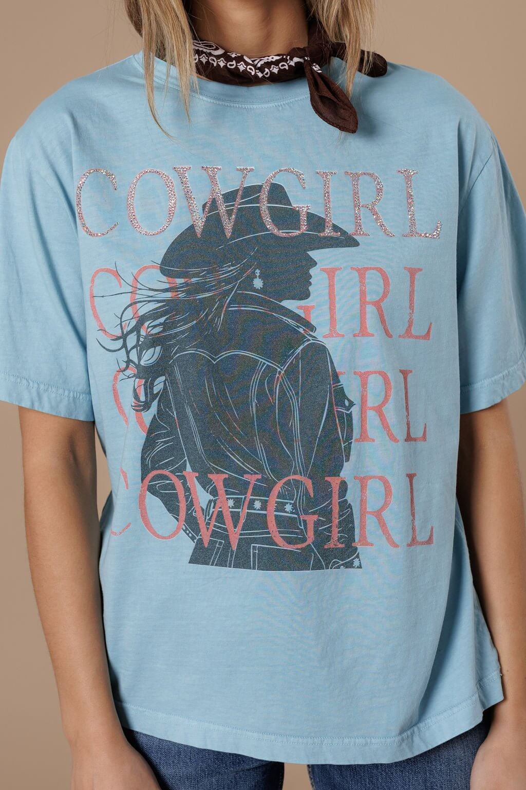 All Us Cowgirl Cowgirl Tee featuring a graphic design, casual fit, and Western-inspired style on soft cotton fabric.