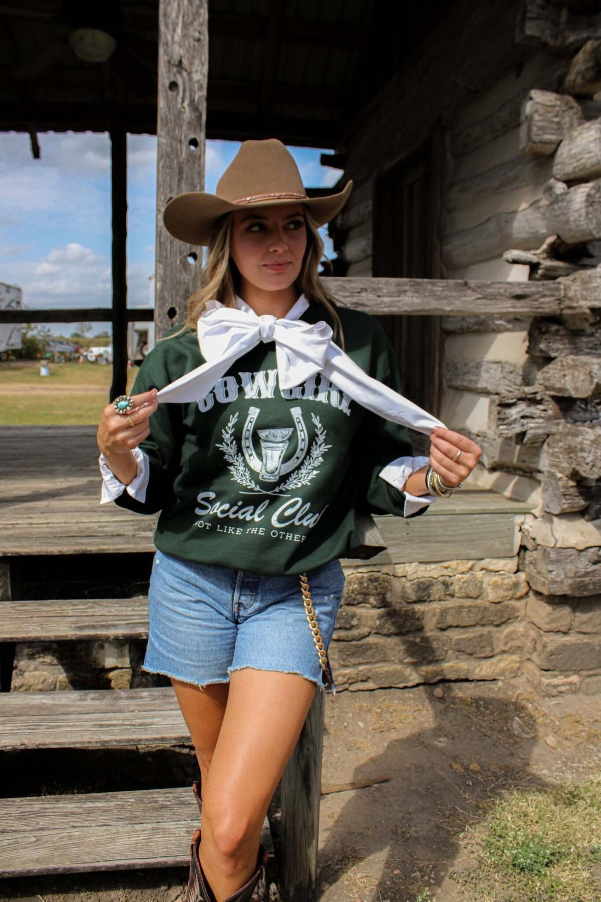 Cream-colored graphic crewneck sweatshirt from Summer Tees featuring a Cowgirl Social Club design on the front.