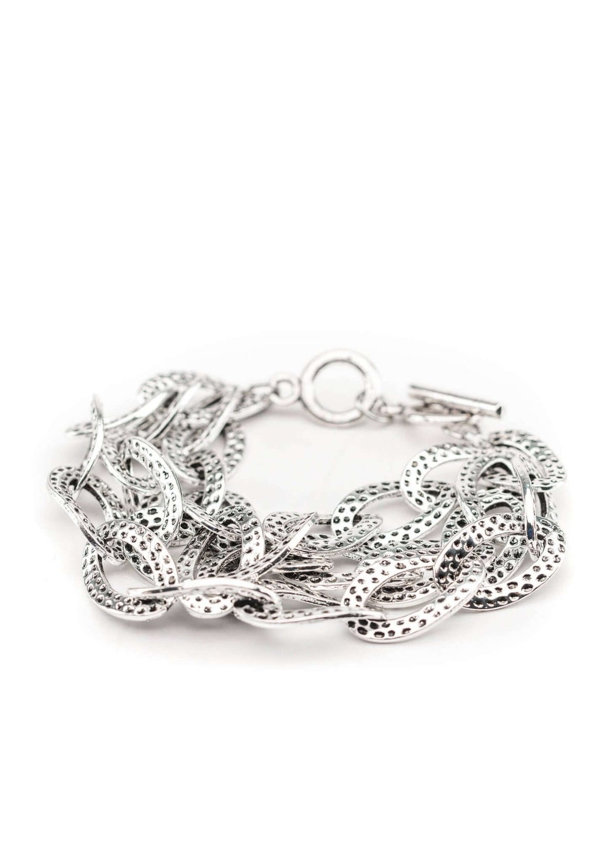 Hammered silver three-strand chain toggle bracelet from West & Co. featuring textured silver links and a toggle clasp.