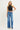 Risen high-rise wide jeans showing front and back with curved seam details, denim fabric, and classic five-pocket design.