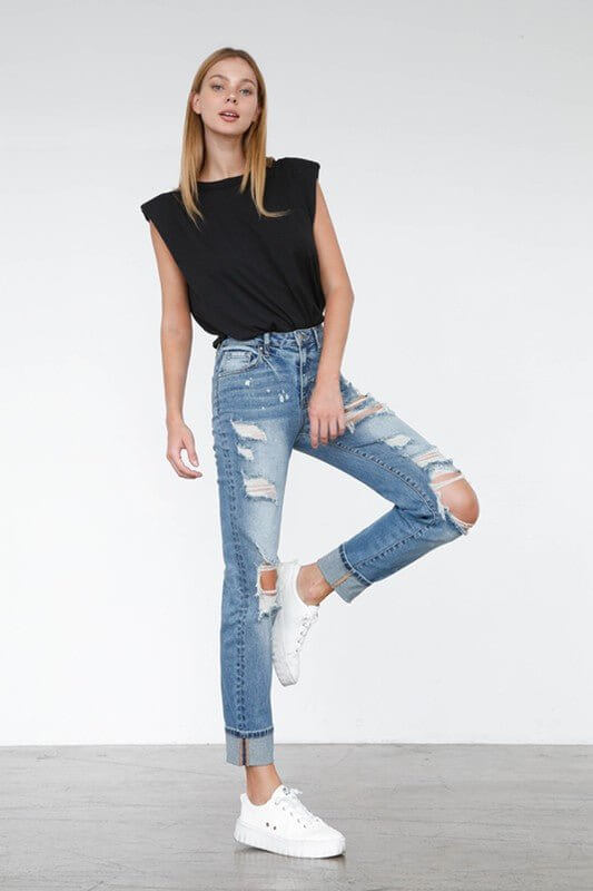 Insane Gene high-waisted distressed girlfriend jeans with ripped light wash stretch denim, showcasing a casual, trendy bottoms style.