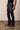 Kimes Ranch Roger jeans, men's denim pants with classic fit, dark wash, and contrast stitching, displayed on a neutral background.