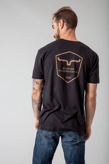 Kimes Ranch Shielded Trucker T-Shirt in black, featuring a classic crew neckline and shield graphic on the front.