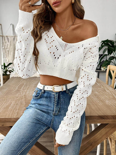 Lily Clothing lapel polo neck crop sweater with cutout detail, showcasing a stylish pullover with a high collar and fitted silhouette.