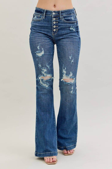 Distressed Judy Blue midrise button fly flare trousers with a relaxed fit and faded denim finish.