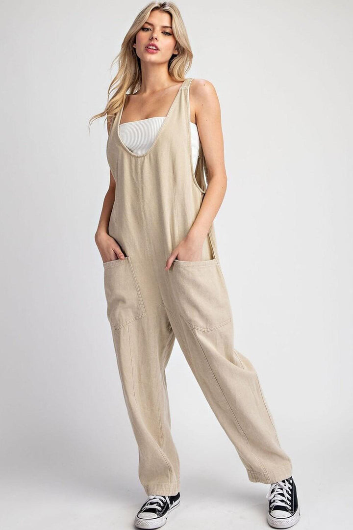 Mineral washed solid scoop neck jumpsuit by ee:some, showcasing its relaxed fit and soft fabric on a model.