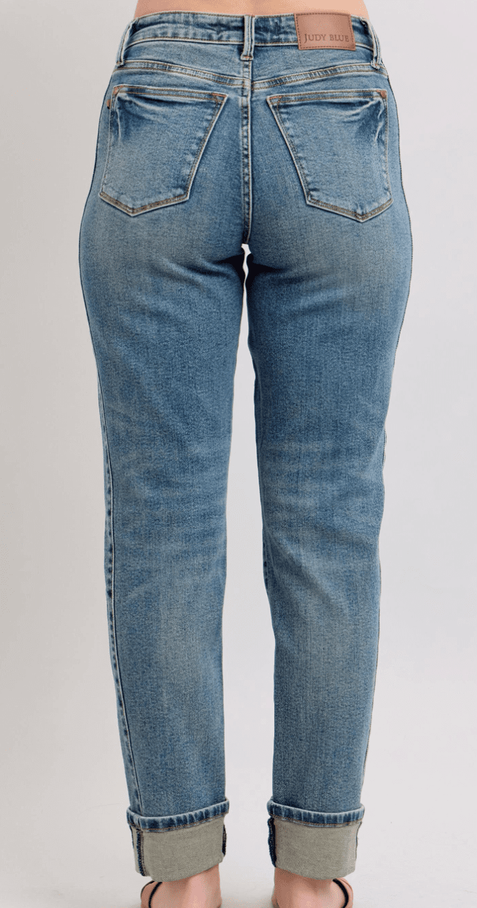 Mr. Vintage Wash Boyfriend Jeans by Judy Blue featuring side seam panel and double roll cuffs, styled on a model.