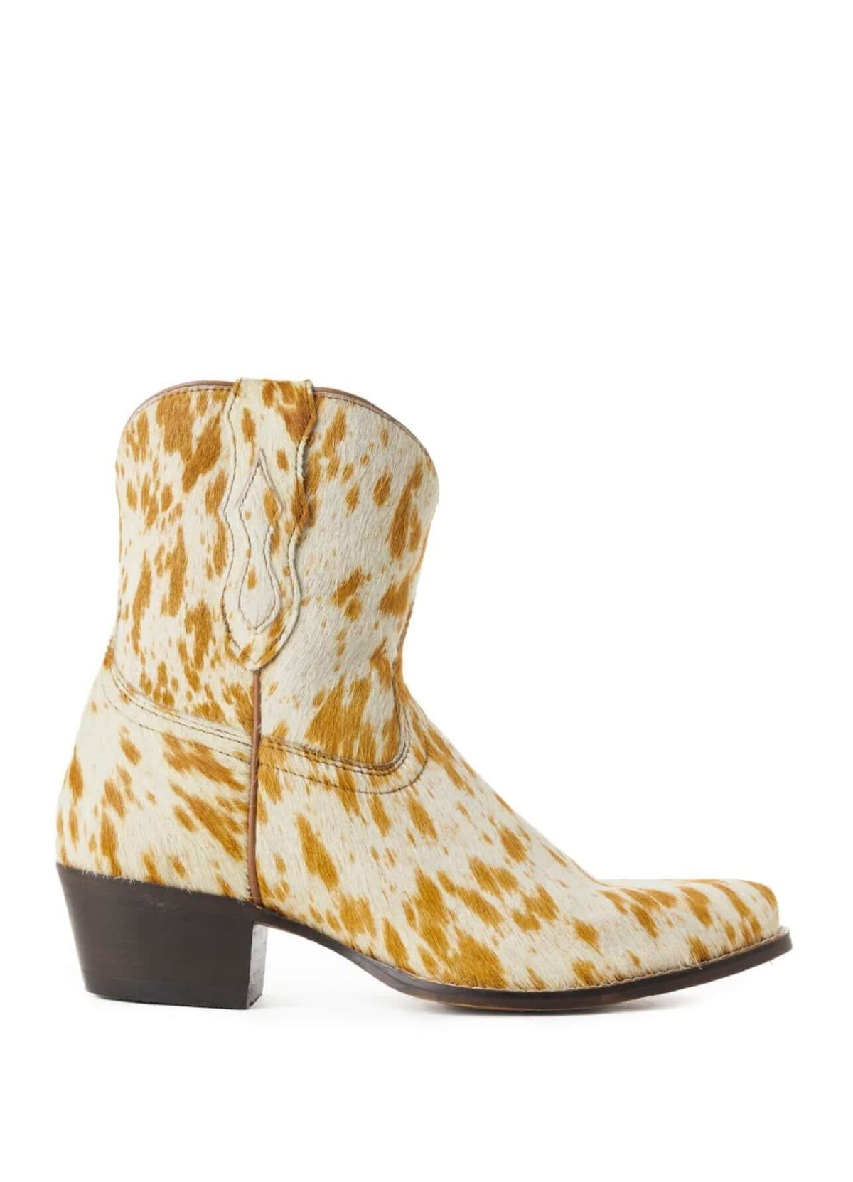 Cowgirl Charm Myra Cowdie Western leather booties with hair-on design, featuring pointed toes and low stacked heels.