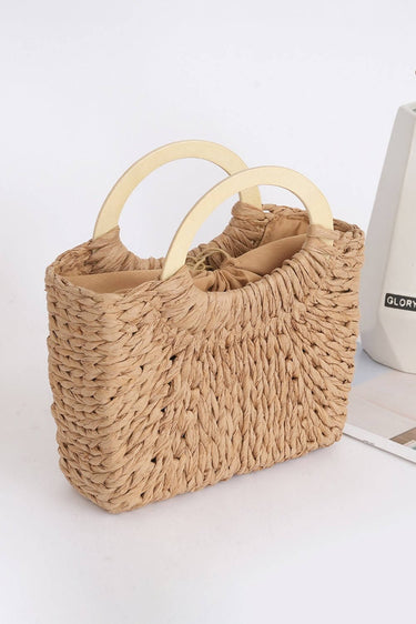 Cowgirl Charm Natural Charm woven handbag with leather strap and intricate woven design, perfect for casual and boho style outfits.