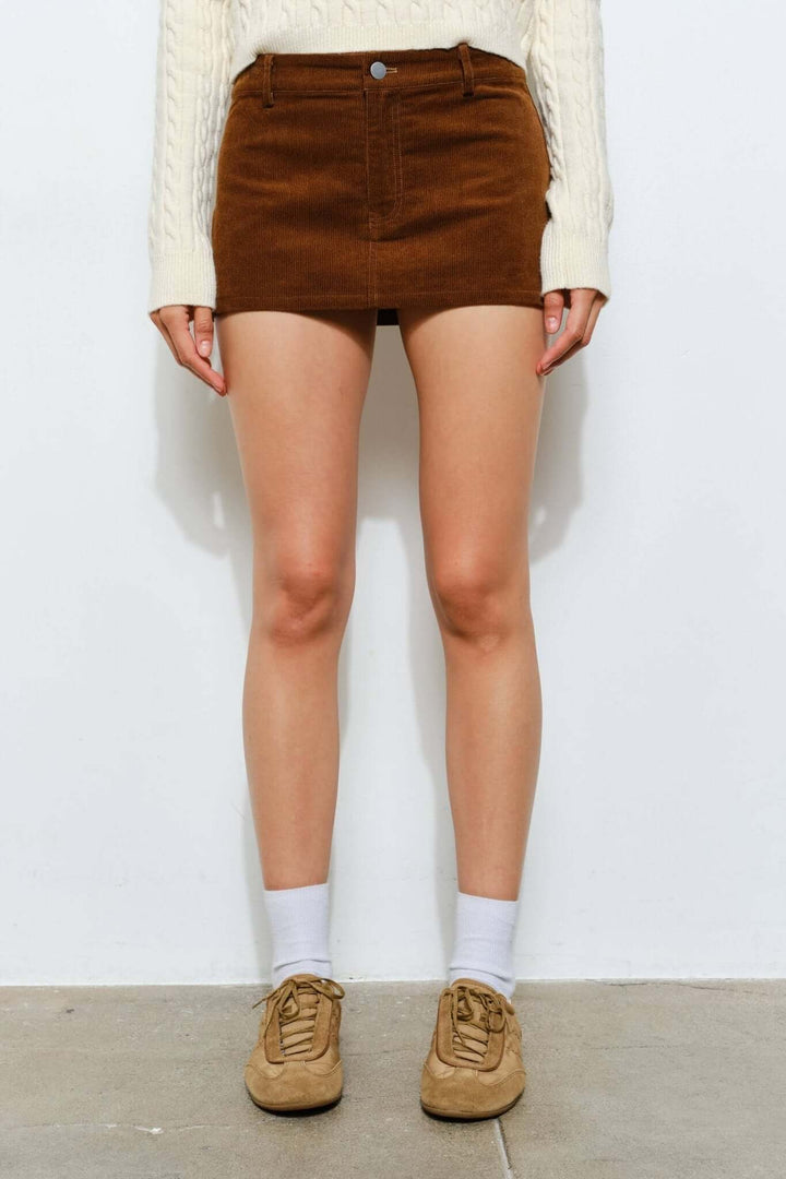 Pretty Garbage Peyton corduroy skort in casual retro style, featuring a fashionable, comfortable design for everyday wear.