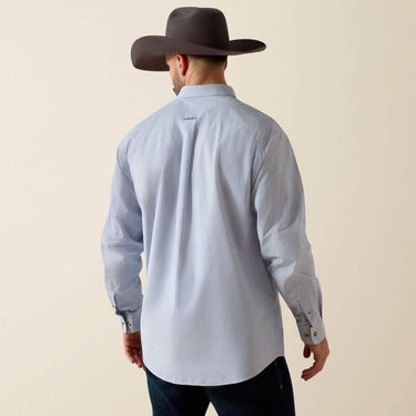 Ariat Pro Series Dayne classic fit shirt in denim, featuring a button-down collar and chest pockets, displayed on a hanger.