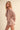 Kimberly C taupe polka dot activewear top featuring a relaxed fit and stylish polka dot pattern for comfortable workouts.