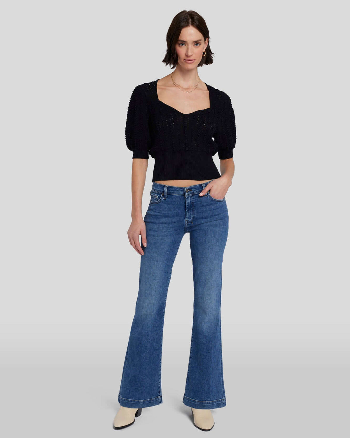7 For All Mankind Dojo Clara jeans, women's denim bottoms with a slim fit and classic five-pocket style, in a medium wash.