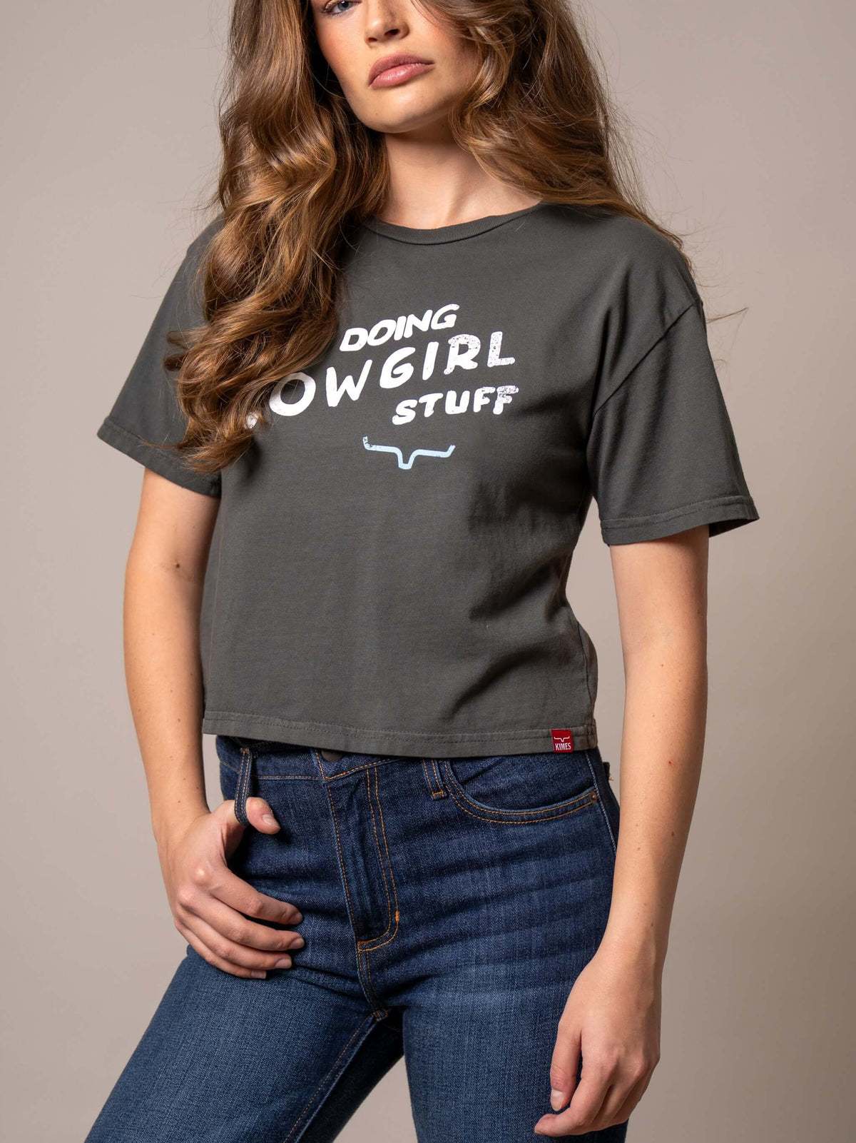 Kimes Ranch "Doing Cowgirl Stuff" cropped graphic tee with western-inspired design and casual fit, perfect for cowgirl style.