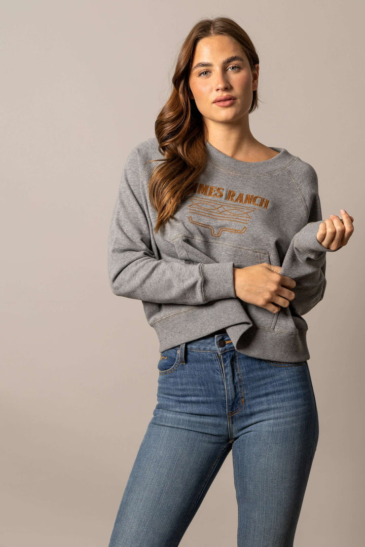 Kimes Ranch women's cropped crewneck sweatshirt in heather grey, soft fabric with a relaxed fit and ribbed cuffs.