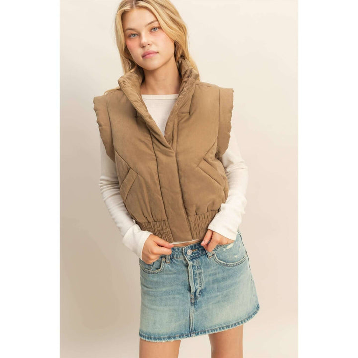HYFVE versatile puffer vest in black, lightweight with quilted design, front zipper, and side pockets for casual wear.