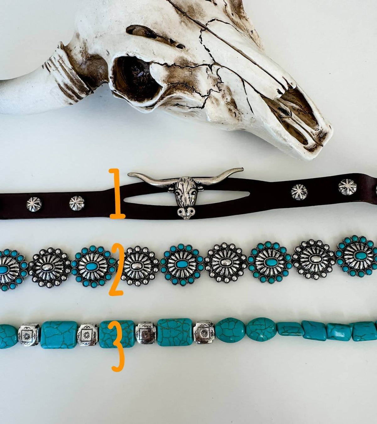 Western hat band with conchos, stones, and longhorn steer accents, designed for cowboy-style accessories by Boho Ranch Shop.