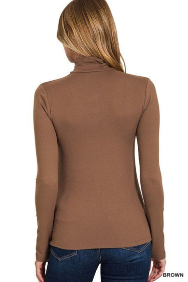 Zenana long sleeve turtleneck top with soft, basic fabric, ideal for layering and casual wear.