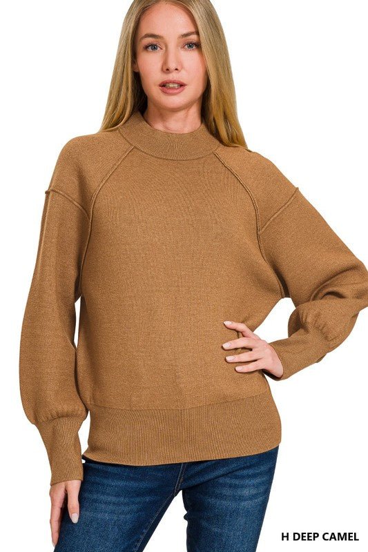 Zenana viscose mock neck short sleeve sweater with exposed seam detail, stylish and comfortable for casual wear.