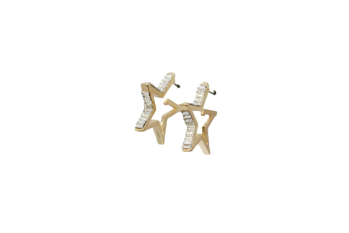 Gold star hoop earring by West & Co. with rhinestone baguette accents, showcasing a 1.5-inch diameter and sparkling detail.