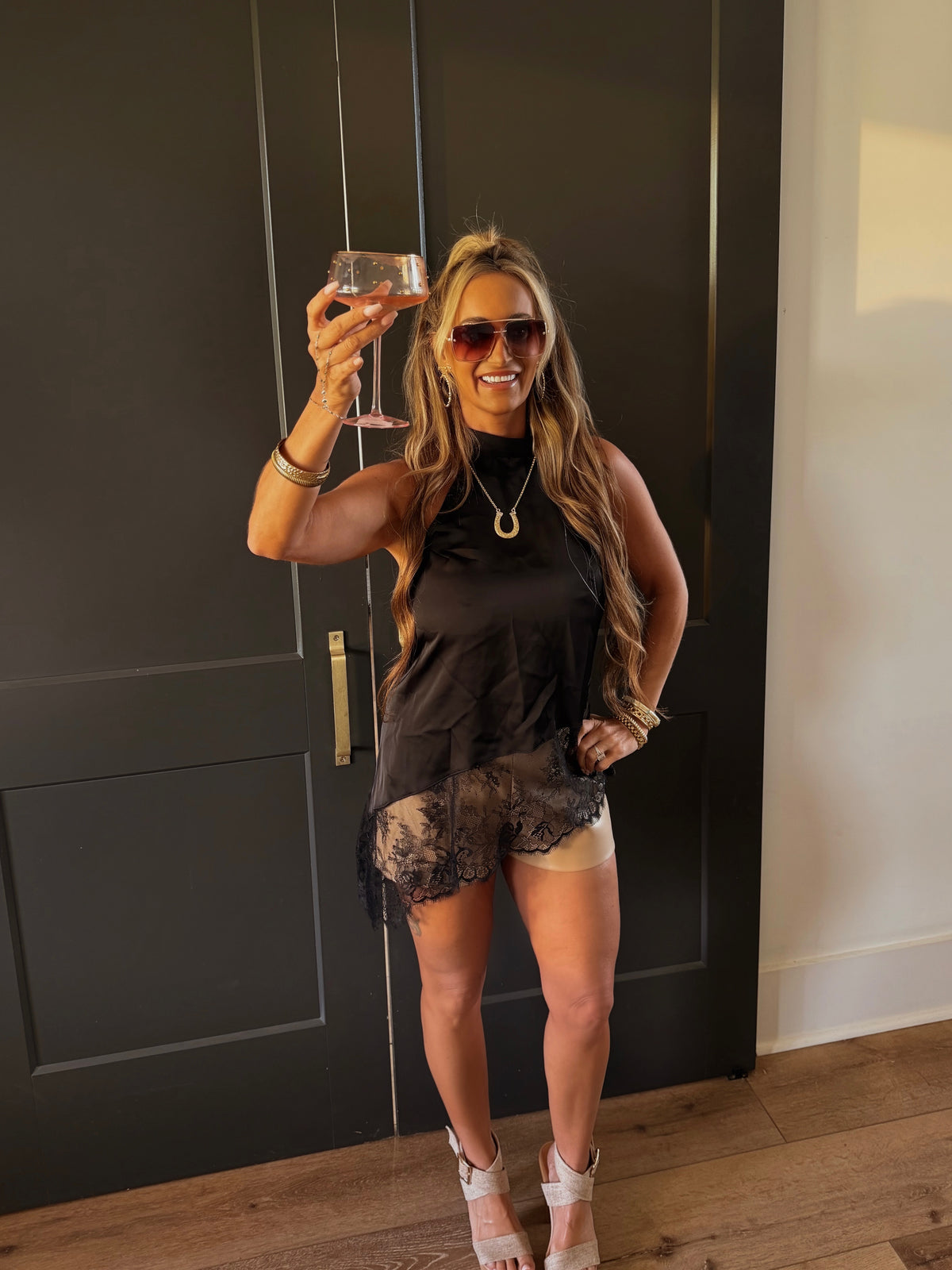Asymmetric lace camisole top from Sunday Up featuring delicate lace and stylish design, perfect for layered or standalone wear.