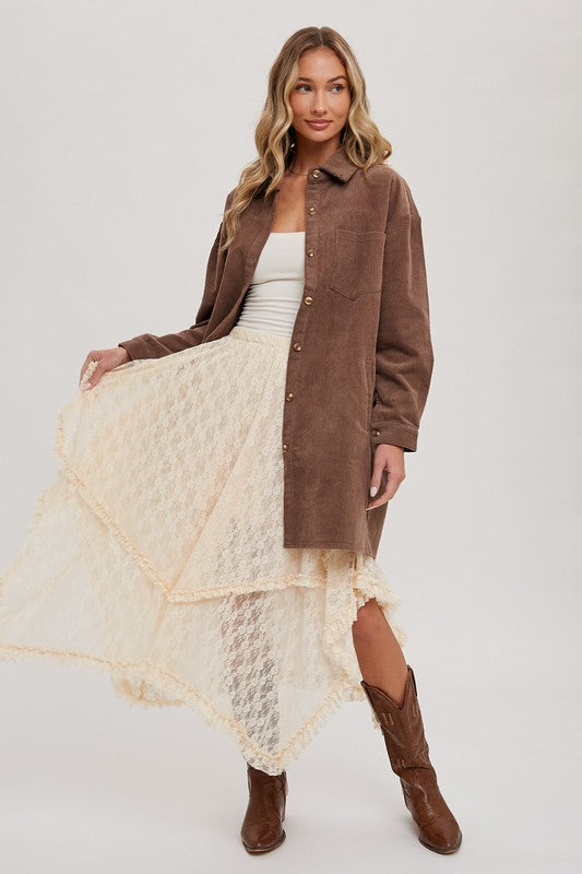 Blueivy cream lace ruffle midi skirt with asymmetrical hem, boho Western-inspired design, featuring lace details and flowing fabric.