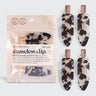 KITSCH eco-friendly creaseless hair clips set, 4 black terrazzo design clips for gentle, stylish hair styling and sectioning.