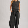 Blueivy Washed Black Sleeveless Jogger Jumpsuit with relaxed fit, drawstring waist, and skirt-style design, shown in the product image.