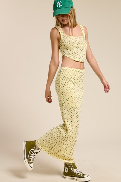 Mimosa floral print corset-fitted tank top and matching skirt set, vibrant and stylish for casual or summer wear.